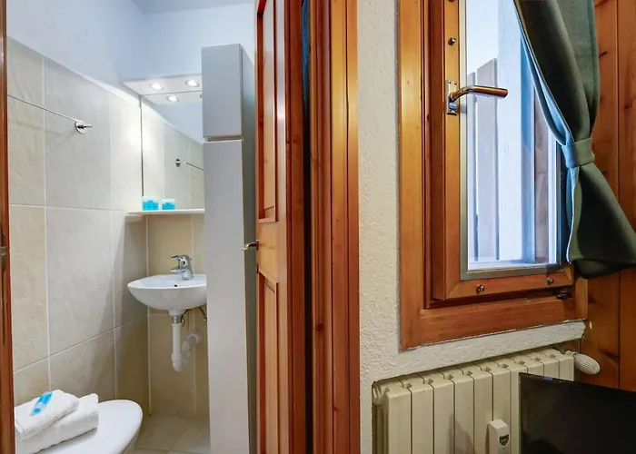 Maison La Cloche Апартаменты Курмайор